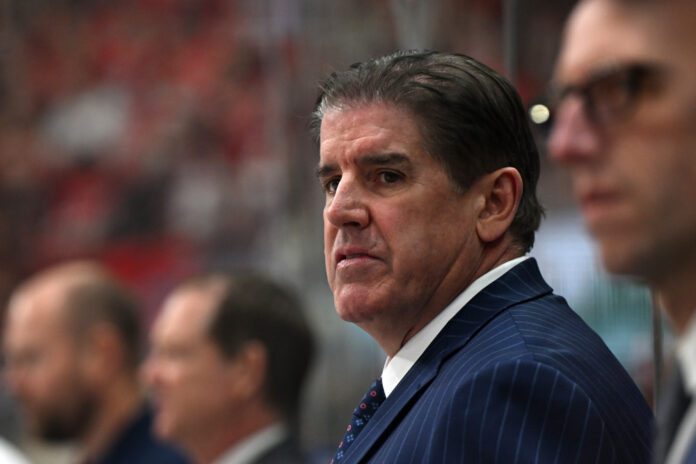 NHL: NOV 27 Rangers at Hurricanes RALEIGH, NC - NOVEMBER 27: New York Rangers head coach Peter Laviolette watches the play during the NHL game between the New York Rangers and the Carolina Hurricanes on November 27, 2024 at Lenovo Center in Raleigh, North Carolina.