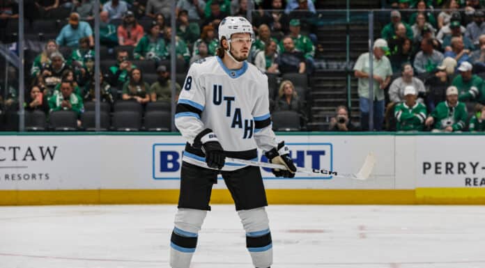 Mikhail Sergachev Injury: Mammoth D-Man Hit in Head by Puck DALLAS, TX - APRIL 12: Utah Hockey Club defenseman Mikhail Sergachev (98) looks for the puck during the game between the Dallas Stars and the Utah Hockey Club on April 12, 2025 at American Airlines Center in Dallas, Texas.