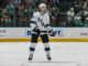 Mikhail Sergachev Injury: Mammoth D-Man Hit in Head by Puck DALLAS, TX - APRIL 12: Utah Hockey Club defenseman Mikhail Sergachev (98) looks for the puck during the game between the Dallas Stars and the Utah Hockey Club on April 12, 2025 at American Airlines Center in Dallas, Texas.