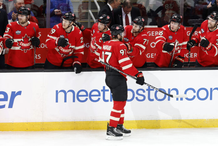 NHL: FEB 17 4 Nations Face-Off - Canada vs Finland BOSTON, MA - FEBRUARY 17: Team Canada forward Connor McDavid (97) passes the bench after scoring during a 4 Nations Face-Off game between Team Canada and Team Finland on February 17, 2025, at TD Garden in Boston, Massachusetts.