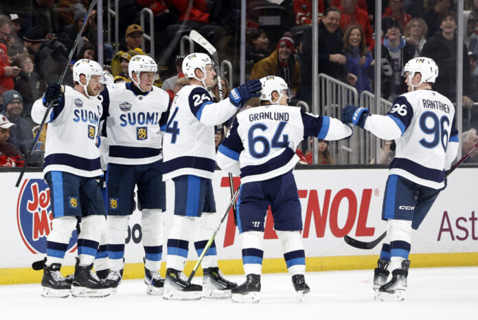 BOSTON, MA - FEBRUARY 17: Finland celebrates the first of two from Team Finland forward Mikael Granlund (64) during a 4 Nations Face-Off game between Team Canada and Team Finland on February 17, 2025, at TD Garden in Boston, Massachusetts. BOSTON, MA - FEBRUARY 17: Finland celebrates the first of two from Team Finland forward Mikael Granlund (64) during a 4 Nations Face-Off game between Team Canada and Team Finland on February 17, 2025, at TD Garden in Boston, Massachusetts.