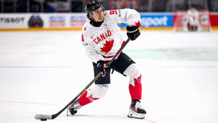 Connor-Bedard-Canada Connor Bedard of Team Canada shoots the puck