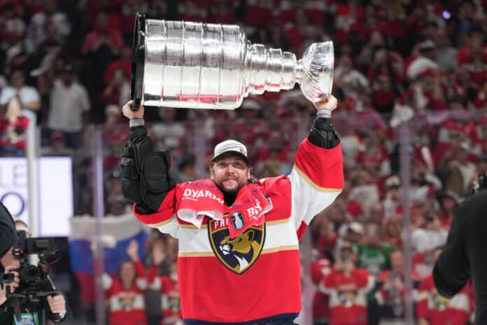 SUNRISE, FL - JUNE 17: Florida Panthers goaltender Sergei Bobrovsky (72) celebrates with the cup hoisted following game six of the Stanley Cup Final between the Edmonton Oilers at the Florida Panthers on Tuesday, June 17, 2025 at Amerant Bank Arena in Sunrise, FL. SUNRISE, FL - JUNE 17: Florida Panthers goaltender Sergei Bobrovsky (72) celebrates with the cup hoisted following game six of the Stanley Cup Final between the Edmonton Oilers at the Florida Panthers on Tuesday, June 17, 2025 at Amerant Bank Arena in Sunrise, FL.
