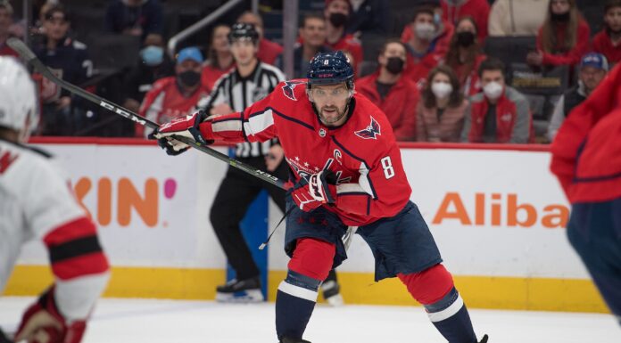 Ovechkin Banned From Latvia Over Putin Party Ad Fallout Alex Ovechkin winds up for a shot in a Washington Capitals home jersey
