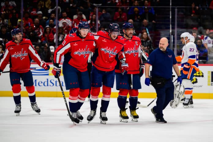 NHL: OCT 31 Islanders at Capitals Washington Capitals left wing Pierre-Luc Dubois is escorted off the ice