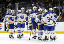 Sabres Injury Update: Lyon, Kulich Hurt in Loss to Wings Buffalo Sabres goalie Alex Lyon celebrates with teammates after Game 3 win over Boston Bruins at TD Garden