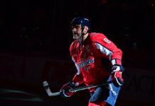 Ovechkin Ice Time: Carbery Won’t Commit to Specifics Alex Ovechkin skates through a spotlight during warm-ups before the Capitals vs Penguins game