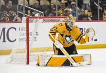 Arturs Silovs Shutout: Penguins Blank Flyers 7-0 in Opener Arturs Silovs Pittsburgh Penguins goaltender glove save PPG Paints Arena 2026