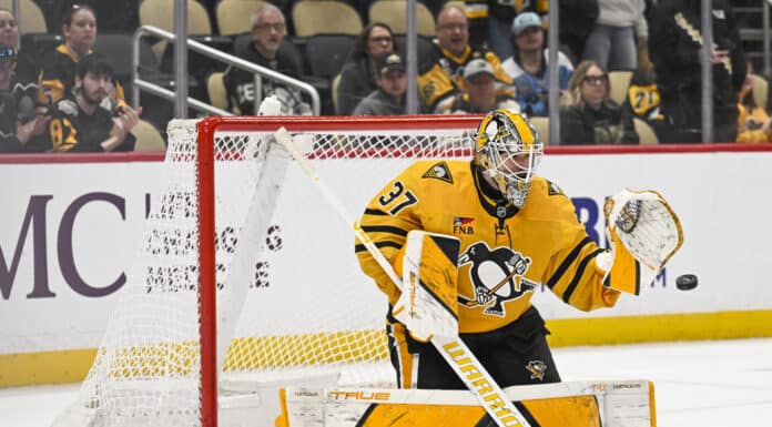 Penguins Goalie Battle: Murashov, Blomqvist Chase Silovs Arturs Silovs Pittsburgh Penguins goaltender glove save PPG Paints Arena 2026