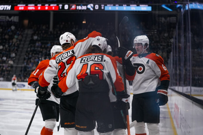 Cam York Flyers Celebration Salt Lake City January 2026 The Philadelphia Flyers celebrate a first period goal scored by Cam York during an NHL game vs the Utah Mammoth at Delta Center in Salt Lake City