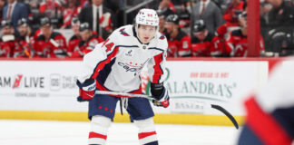 Cole Hutson NHL Debut: ‘Shaking in the Pregame Meeting Seat’ Cole Hutson of the Washington Capitals looks on during a game against the Devils