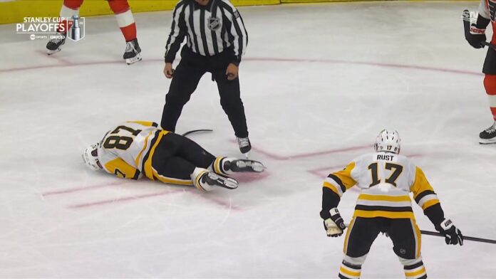 crosby-embellishment-on-ice-sportsnet-game-3-2026 Sidney Crosby lying on ice after Garnet Hathaway high stick embellishment call Flyers Penguins Game 3 2026 playoffs