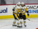 Crosby, Malkin, Letang Set NHL Record for Wins by a Trio Sidney Crosby and Evgeni Malkin celebrate a goal together on the ice