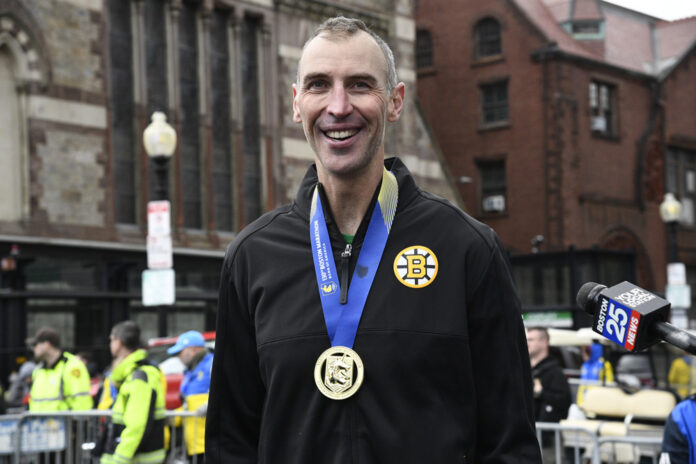 MARATHON: APR 20 130th Boston Marathon presented by Bank of America Former NHL player and former Boston Bruins captain Zdeno Chara smiles for a photo with his finisher’s medal after completing the 130th Boston Marathon