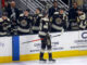 Hershey Bears center Ilya Protas is congratulated by teammates after scoring a goal against the Cleveland Monsters