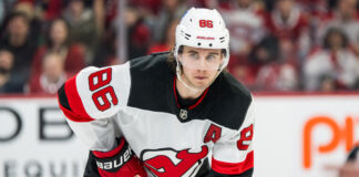 Jack Hughes, Nico Hischier Take Blame for Tom Fitzgerald Firing Jack Hughes of the New Jersey Devils waits for play to begin at the Bell Centre