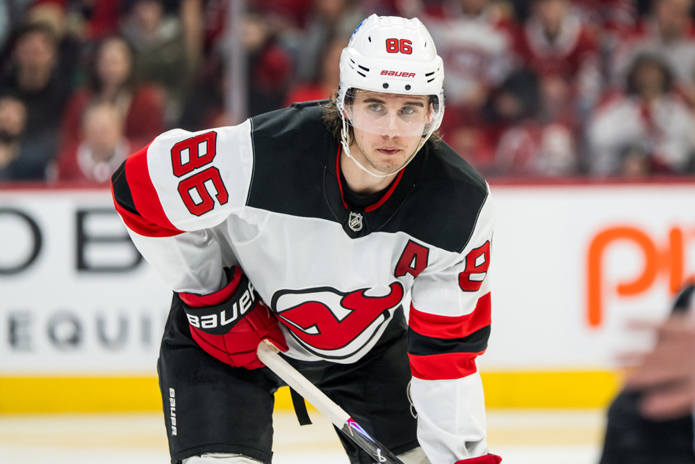 Jack Hughes of the New Jersey Devils waits for a faceoff at the Bell Centre