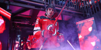 Jack Hughes Injury Concern: Devils Went 8-13-0 Without Him Jack Hughes of the New Jersey Devils takes the ice at Prudential Center amid arena lights