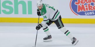 Jamie Benn Re-Signs With Stars on One-Year Discount Deal Jamie Benn carries the puck for the Dallas Stars during the 2026 NHL Playoffs
