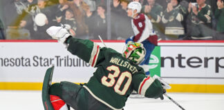 Jesper Wallstedt celebrates a shootout win for the Minnesota Wild