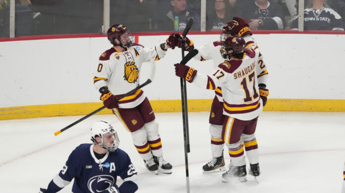 NCAA HOCKEY: MAR 27 Men's Regional - Penn State vs Minnesota Duluth Max Plante of Minnesota Duluth celebrates scoring a goal during the NCAA Hockey Regional Tournament