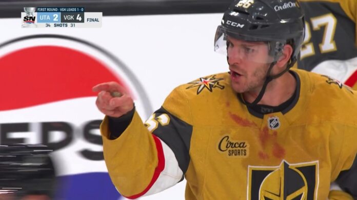 nic-dowd-pointing-cooley-game-1-vegas Vegas Golden Knights Nic Dowd points bloody jersey Game 1