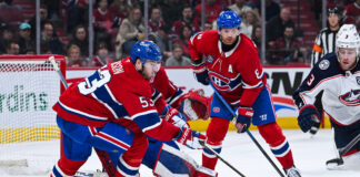 Noah Dobson skating in a Montreal Canadiens jersey