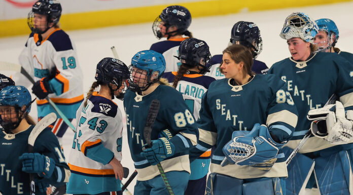 Hockey Night in Canada Returning With PWHL, Report Says New York Sirens and Seattle Torrent players shake hands after a PWHL Takeover Tour game