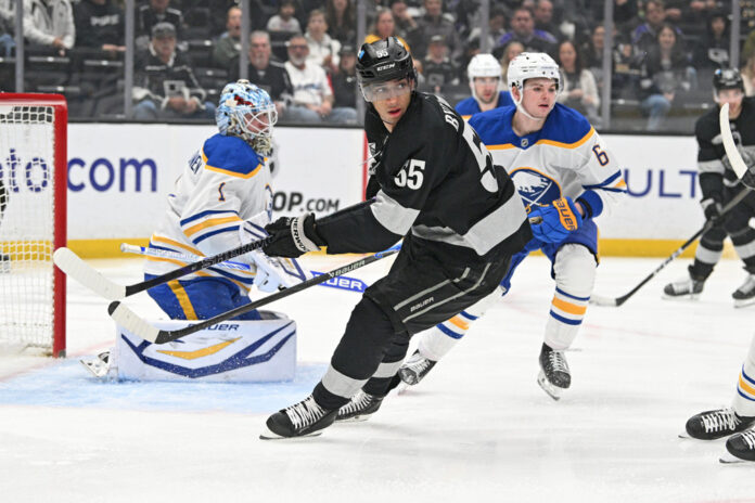 Quinton Byfield of the LA Kings turns toward the play during a game at Crypto.com Arena