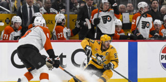 Flyers Fan Paints ‘RIP Bozo’ Crosby Dive Outline on Ice Pittsburgh Penguins Sidney Crosby skates with the puck against Philadelphia Flyers defenseman Cam York during Game 5 of the 2026 Stanley Cup Playoffs at PPG Paints Arena