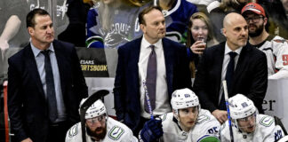 Adam Foote Joins Mammoth Staff After Canucks Firing Vancouver Canucks coaching staff Adam Foote Mike Yeo Rick Tocchet on the bench