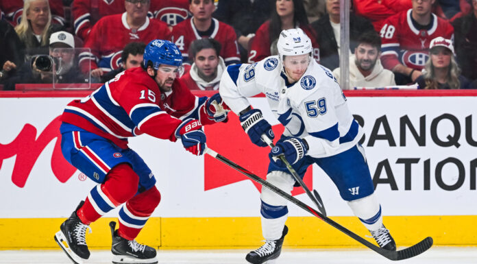 Newhook Extension: ‘There’s Always a Risk in Waiting It Out’ Montreal Canadiens center Alex Newhook defends the puck against Tampa Bay Lightning center Jake Guentzel during the 2026 Stanley Cup Playoffs First Round at Bell Centre