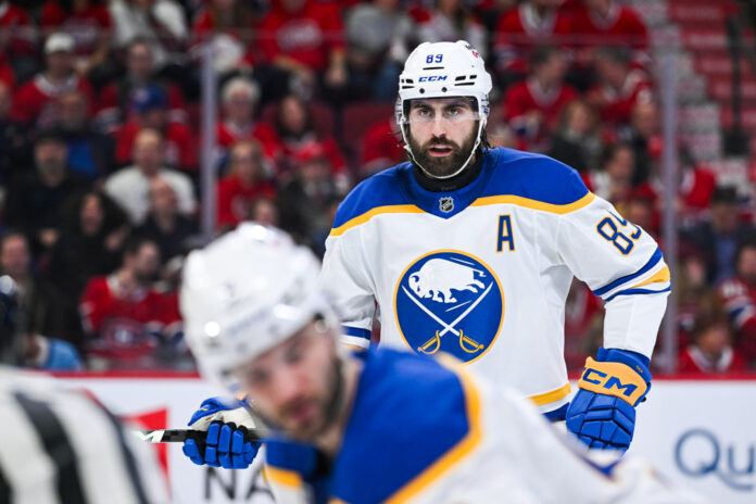 Alex Tuch Buffalo Sabres face-off Game 4 vs Canadiens 2026 playoffs Buffalo Sabres right wing Alex Tuch waits for a face-off during Game 4 of the 2026 Stanley Cup Playoffs Second Round vs Canadiens at Bell Centre