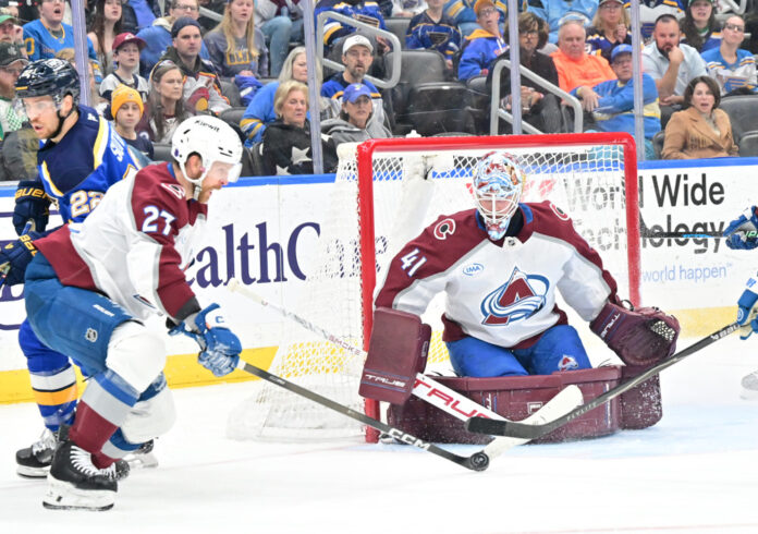 Brett Kulak Avalanche blocks shot at Blues 2026 Colorado Avalanche defenseman Brett Kulak knocks the puck away from goal vs Blues April 7 2026