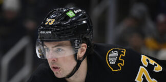 Bruins Captain: Neely Not Sure They Need to Name One Charlie McAvoy Boston Bruins close-up during game between Pittsburgh Penguins and Boston Bruins