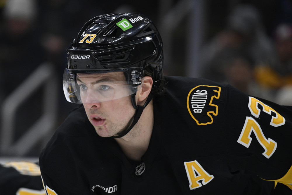 Charlie McAvoy of the Boston Bruins waits for a faceoff