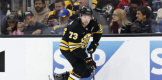 Charlie McAvoy Suspended 6 Games for Slash on Zach Benson Charlie McAvoy carries the puck for the Boston Bruins during Game 6 vs the Sabres