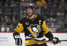 Crosby Extension: ‘I’d Like to Continue Playing for Years’ Sidney Crosby Pittsburgh Penguins captain smiles after face-off in NHL game between Penguins and Colorado Avalanche at PPG Paints Arena