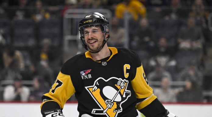 The 10 Greatest NHL Players of All Time, Ranked Sidney Crosby Pittsburgh Penguins captain smiles after face-off in NHL game between Penguins and Colorado Avalanche at PPG Paints Arena