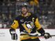 The 10 Greatest NHL Players of All Time, Ranked Sidney Crosby Pittsburgh Penguins captain smiles after face-off in NHL game between Penguins and Colorado Avalanche at PPG Paints Arena