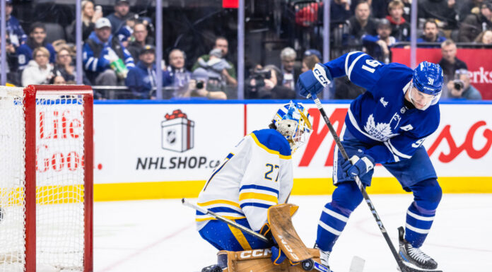 Tavares Week-to-Week: Leafs Center Out With Lower-Body Injury Buffalo Sabres goaltender Devon Levi makes a save against Toronto Maple Leafs center John Tavares during an NHL game