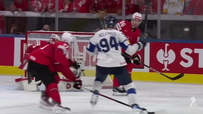 Konsta Helenius scores golden goal Finland 2026 IIHF World Championship Finland celebrates 2026 IIHF World Championship gold medal, Jesse Puljujarvi Konsta Helenius golden goal
