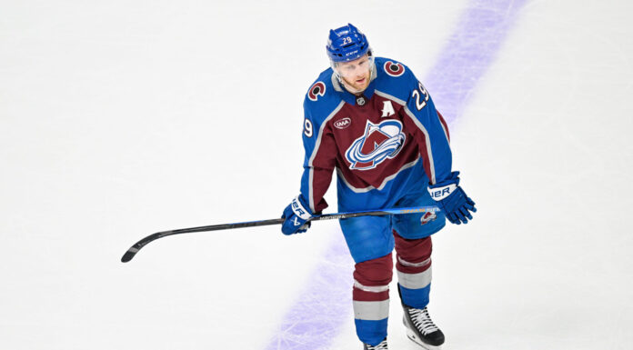 NHL Top 20 Centers Rankings: McDavid vs. MacKinnon at No. 1 Colorado Avalanche center Nathan MacKinnon 29 looks on during break second period Game 5 Stanley Cup Playoffs Second Round vs Minnesota Wild Ball Arena May 13 2026