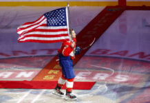 Matthew Tkachuk, Nick Cousins Fined After Ottawa Scrum Matthew Tkachuk skates with the USA flag celebrating his Olympic Gold medal at a Florida Panthers game on February 26, 2026
