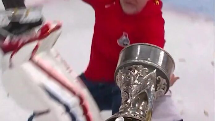 Alexei Melnichuk Gagarin Cup Fall 2026 Alexei Melnichuk falls with Gagarin Cup during Lokomotiv Yaroslavl championship celebration