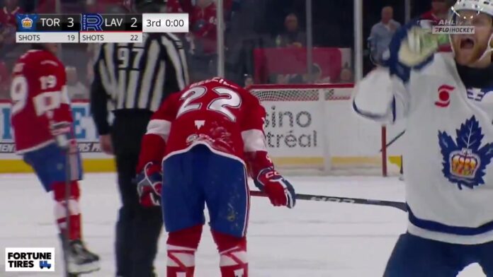 Dakota Mermis drinks fan-tossed beer in Game 5 win at Place Bell Toronto Marlies defenseman Dakota Mermis drinks beer thrown by Laval Rocket fan after Game 5 at Place Bell