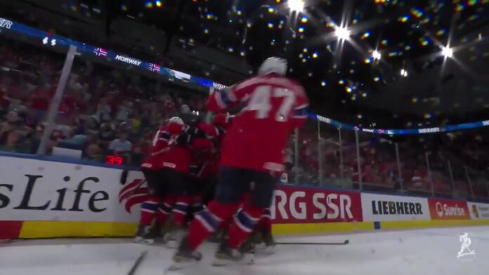 Norway players celebrate bronze medal vs Canada 2026 IIHF Worlds Norway players celebrate Noah Steens overtime goal to beat Canada and win bronze at 2026 IIHF World Championship