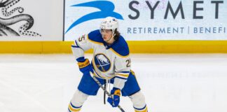 Sabres Reveal Owen Power Played Through Grade-3 Ankle Sprain Buffalo Sabres defenseman Owen Power on the ice with the puck