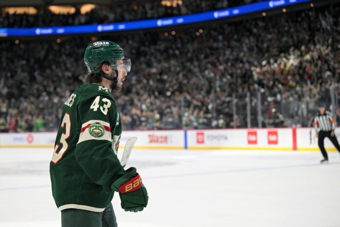 Quinn Hughes celebrates power play goal Wild vs Avalanche Game 3 May 2026 Minnesota Wild defenseman Quinn Hughes celebrates power play goal Game 3 Second Round 2026 Stanley Cup Playoffs vs Colorado Avalanche