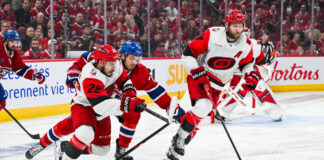 Eichel, Hanifin, Slavin Chase Rare Olympic-Cup Double Since 1980 Carolina Hurricanes defenseman Jaccob Slavin escapes with the puck during Game 3 of the 2026 Eastern Conference Final against the Montreal Canadiens at Bell Centre, May 25, 2026